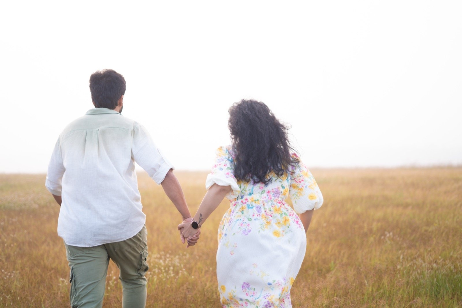 Couple Walking Together at Sunset