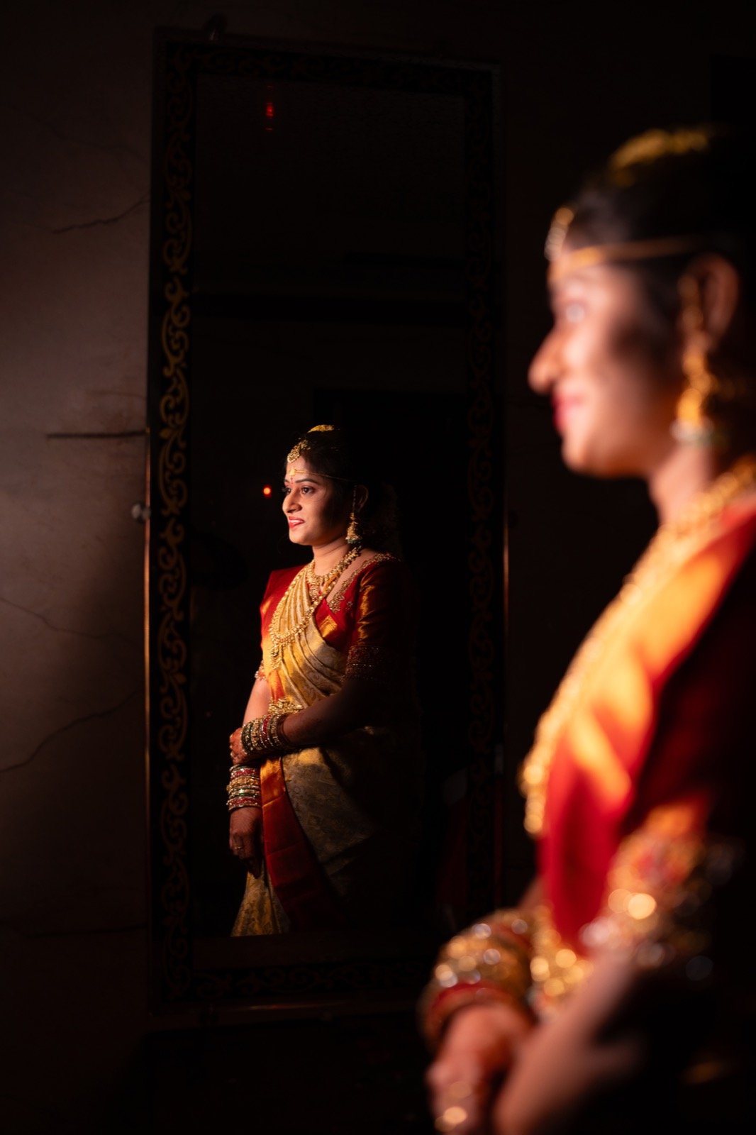 Bride Mirror Reflection in Traditional Silk and Gold